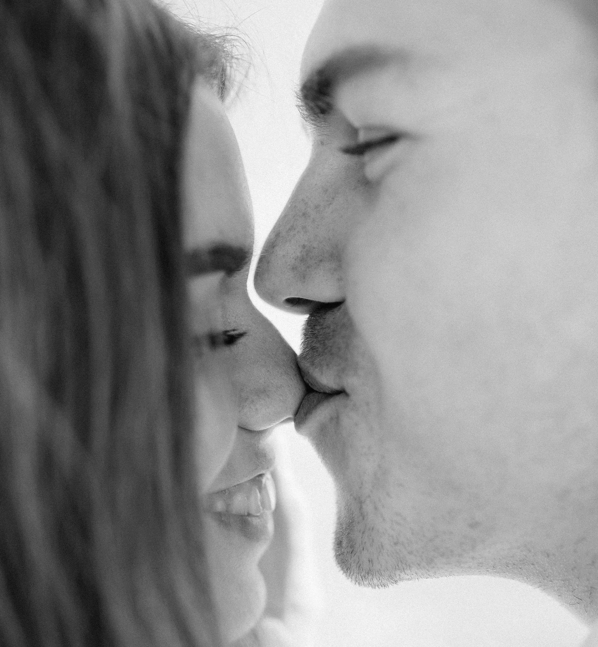 Couple sharing a close, tender moment, cosmetic dentistry near Southampton