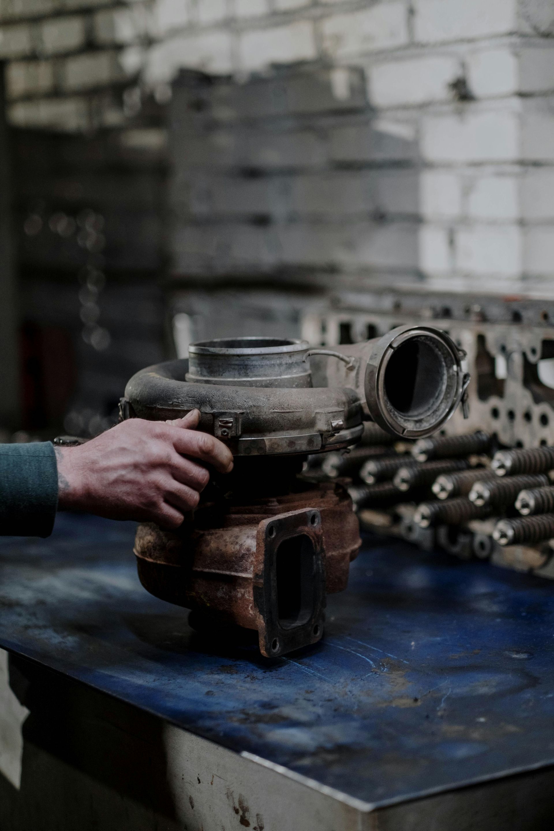 Person Holding a Used Turbocharger | Hyde Auto Service