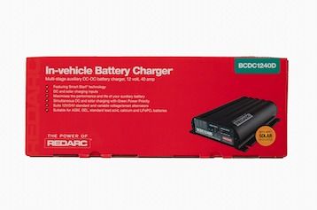 A Red Box With A Battery Charger In It — Rainbow Beach Auto Electrics In Rainbow Beach, QLD