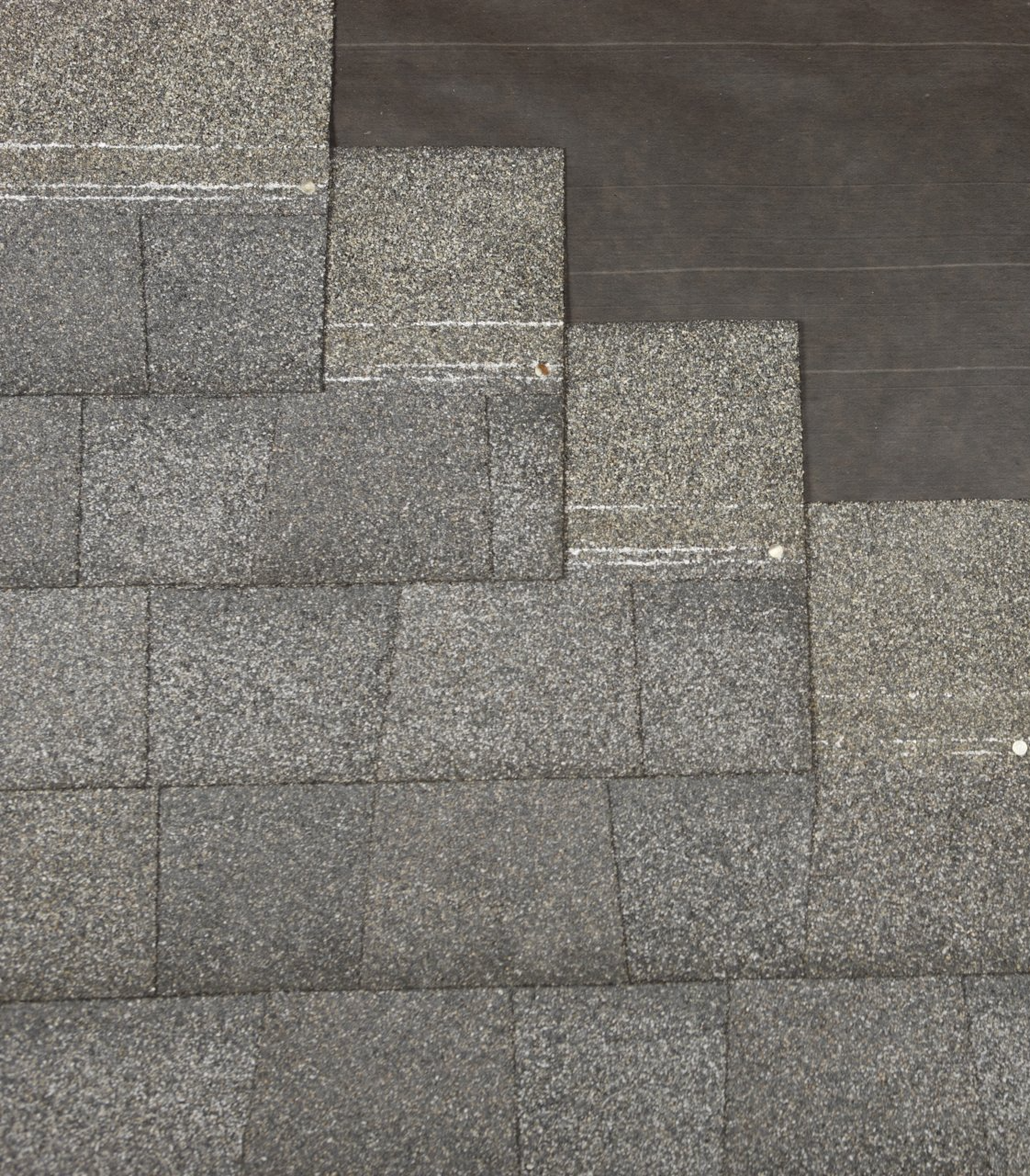 A set of stairs made of gray tiles