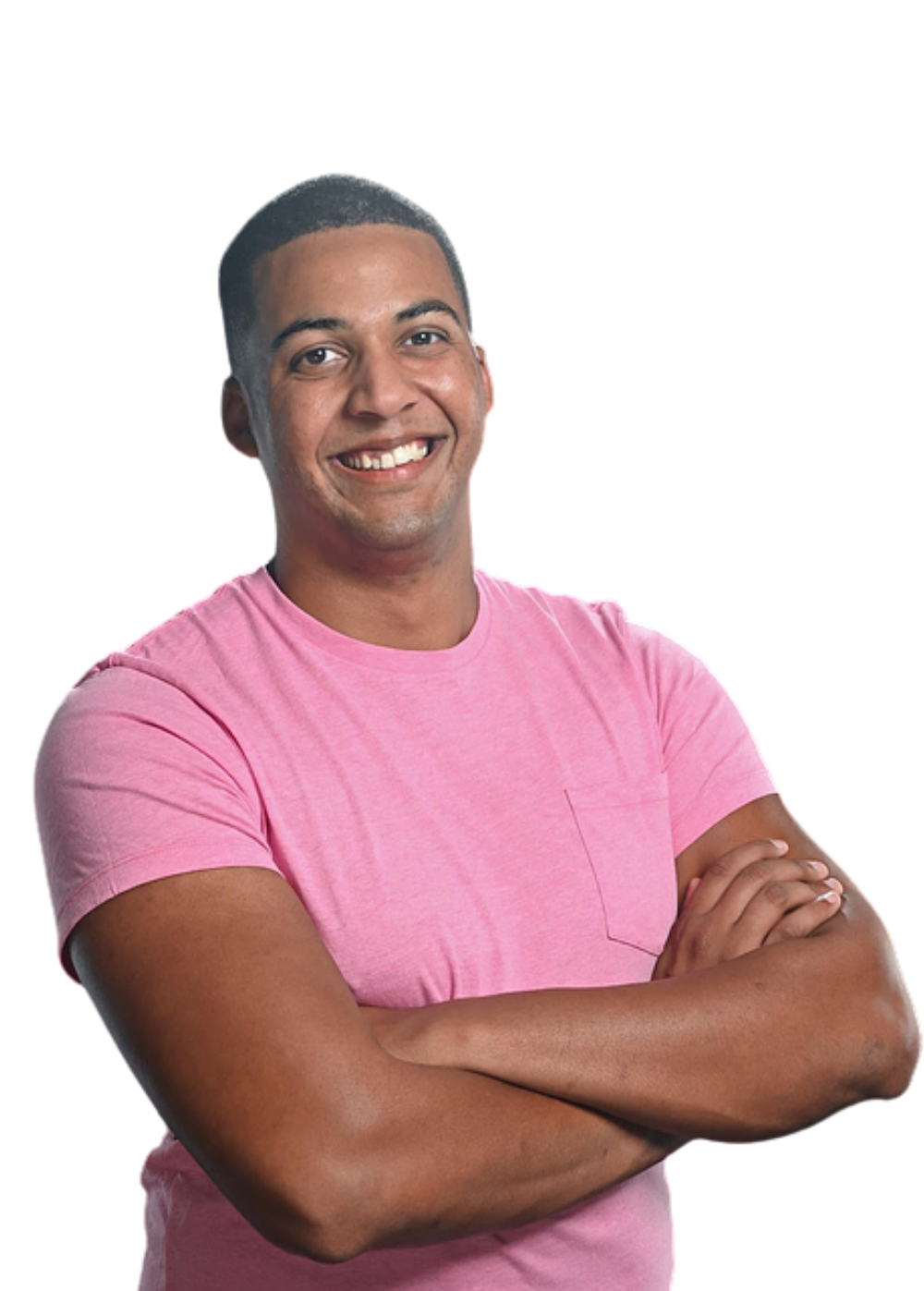 Smiling person in a pink T-shirt with arms crossed against a white background