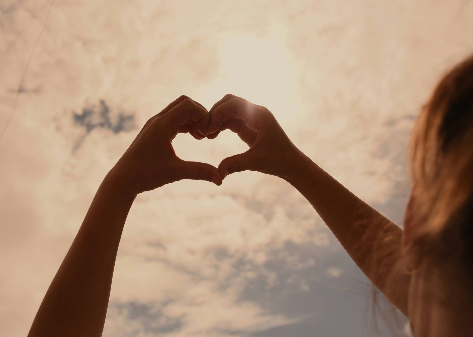Hand Hearts Into the Sky