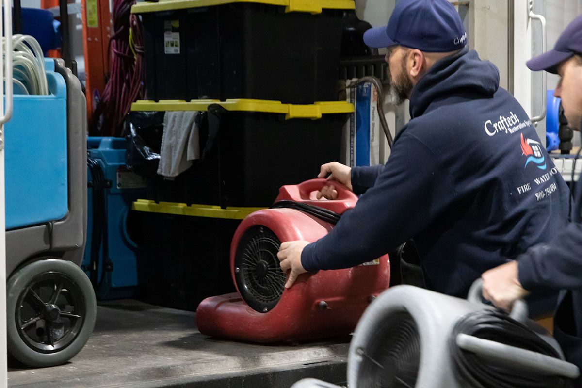 Craftech employee using equipment