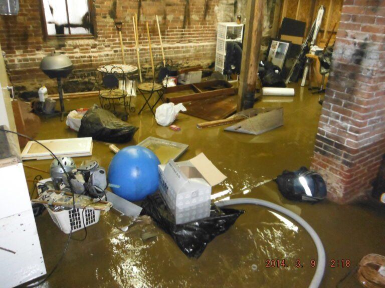 A flooded room with a blue ball on the floor