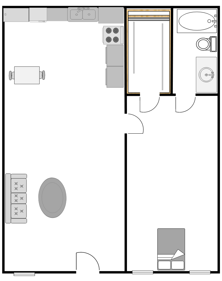 Floor plan of a studio apartment with kitchen, bathroom, and living space.