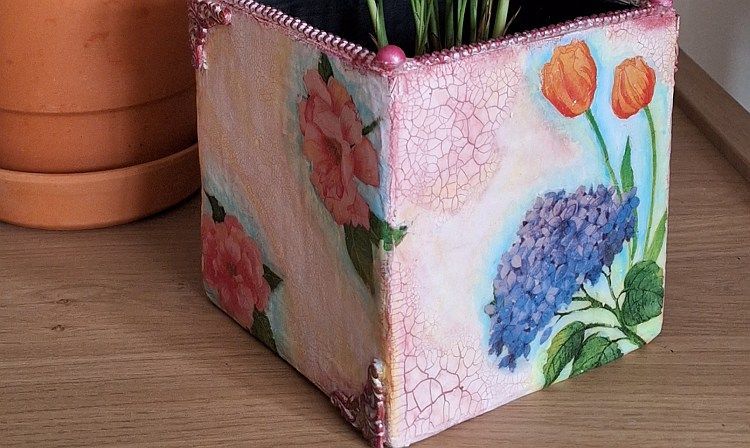 cardboard decorated with napkins and paint