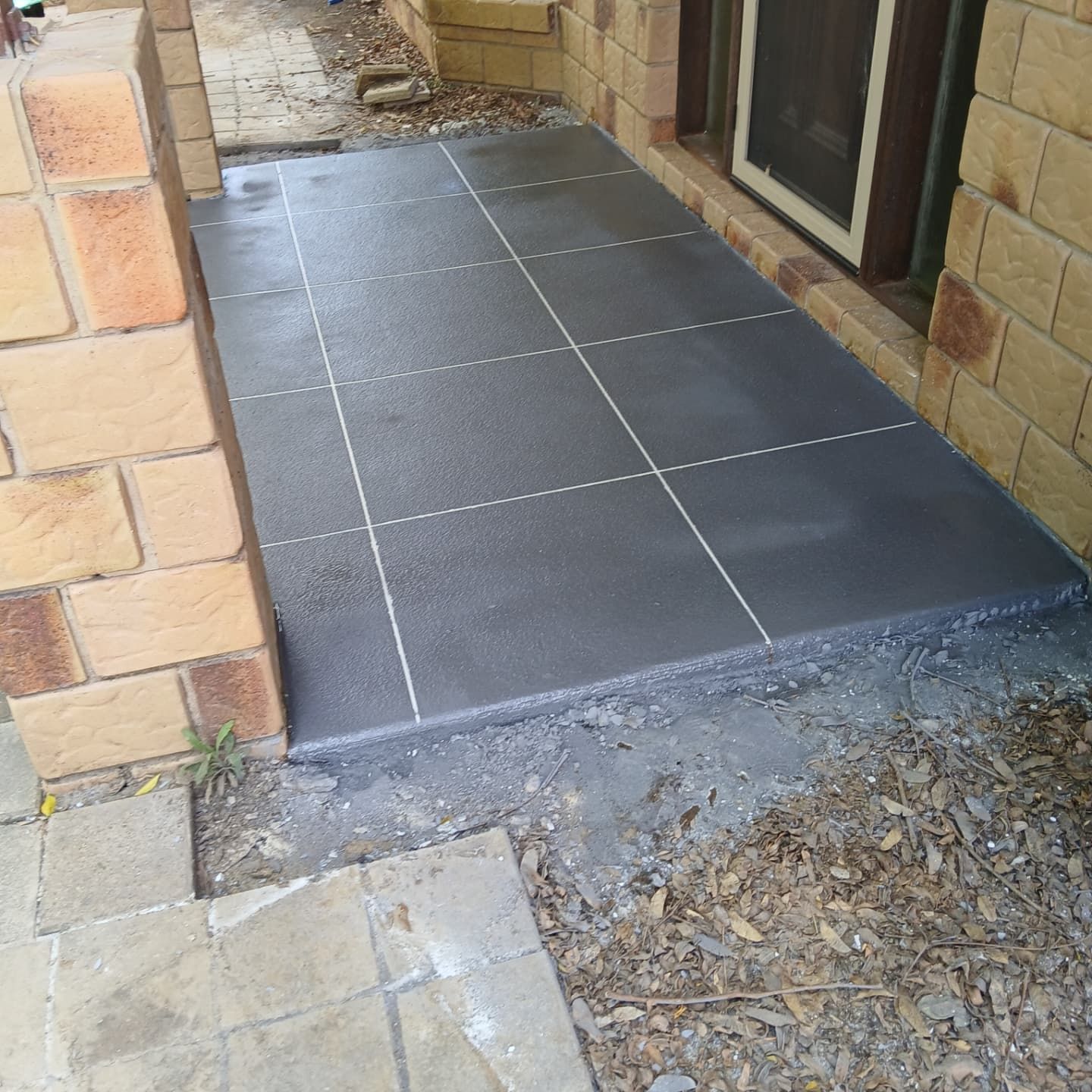 small area of concrete resurfacing — Troys Concrete Overlays in Hillcrest, QLD