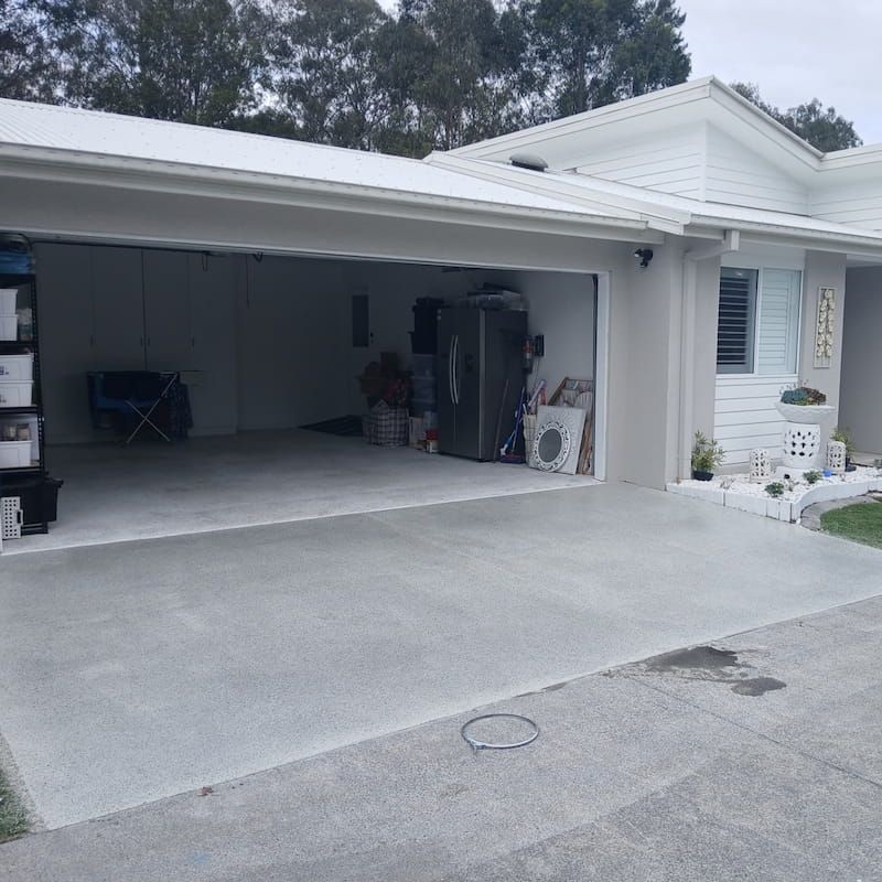 Before a driveway resurface — Troys Concrete Overlays in Hillcrest, QLD