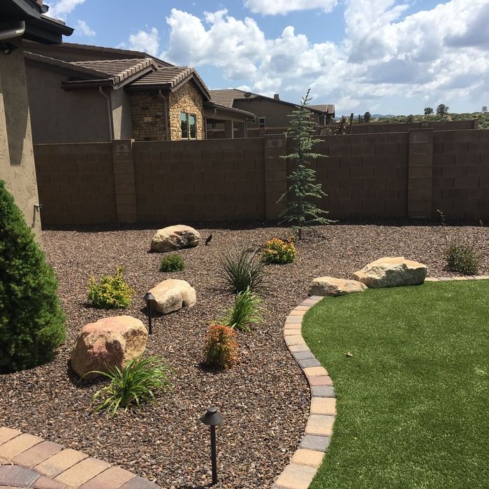 A photo of a professionally landscaped yard