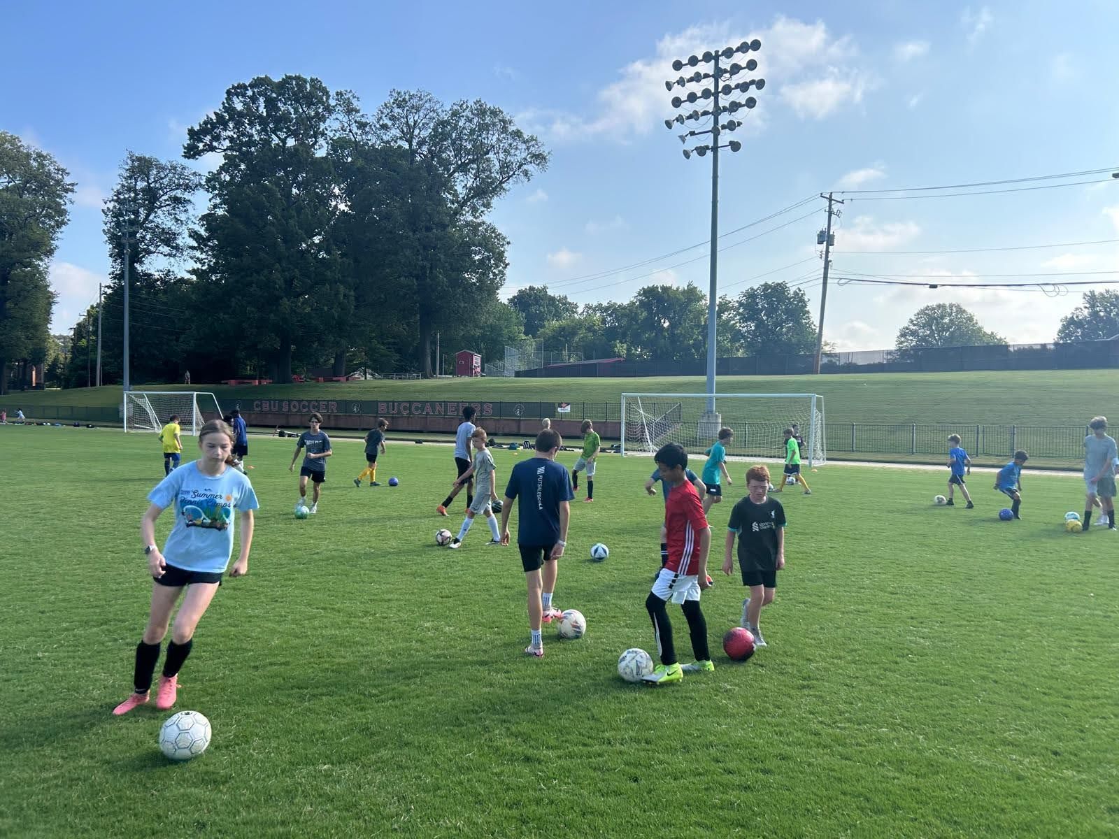 Olé FC kids practicing on a field