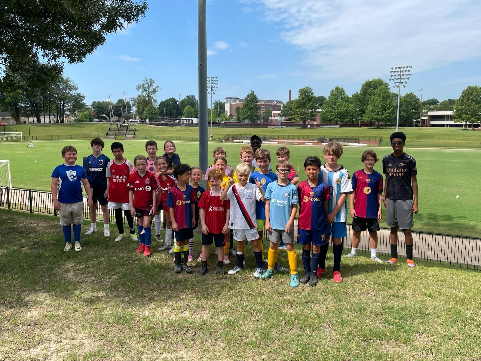 Olé FC camp players posing