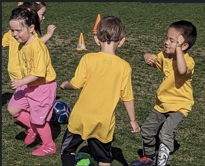 Olé FC Academy players on the field