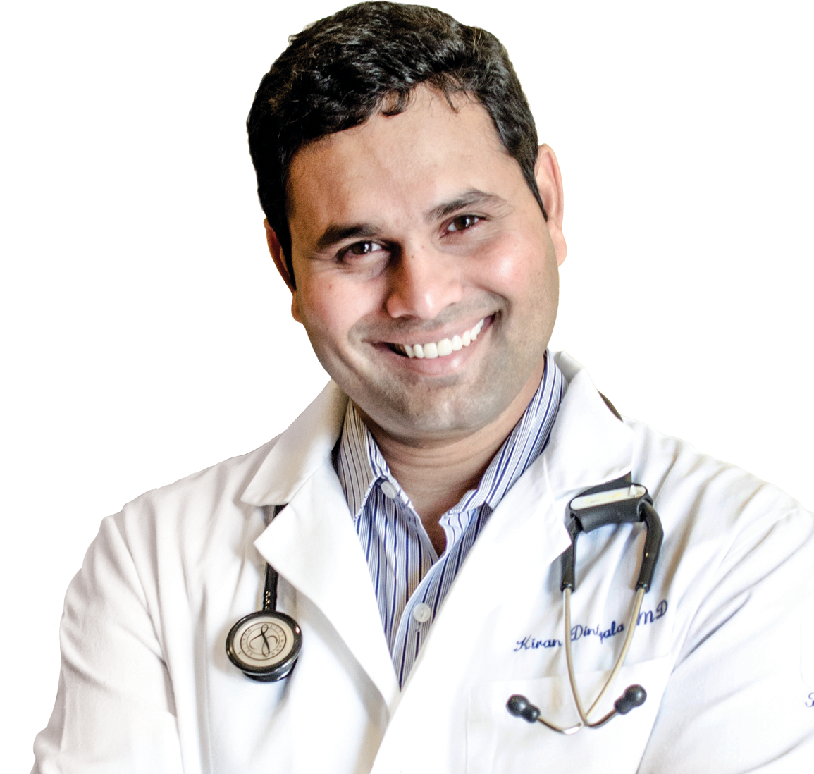 Doctor smiling, wearing white coat and stethoscope.