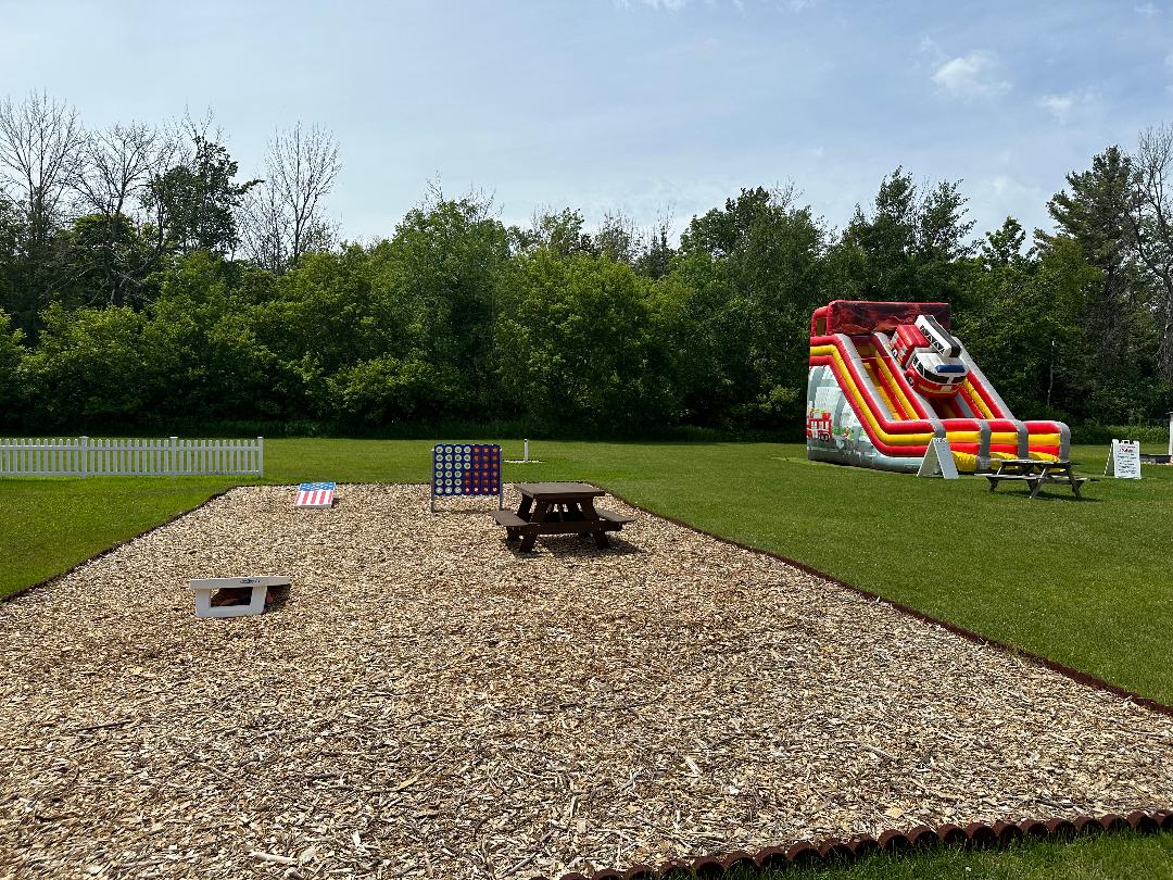 Cornhole and Bounce House