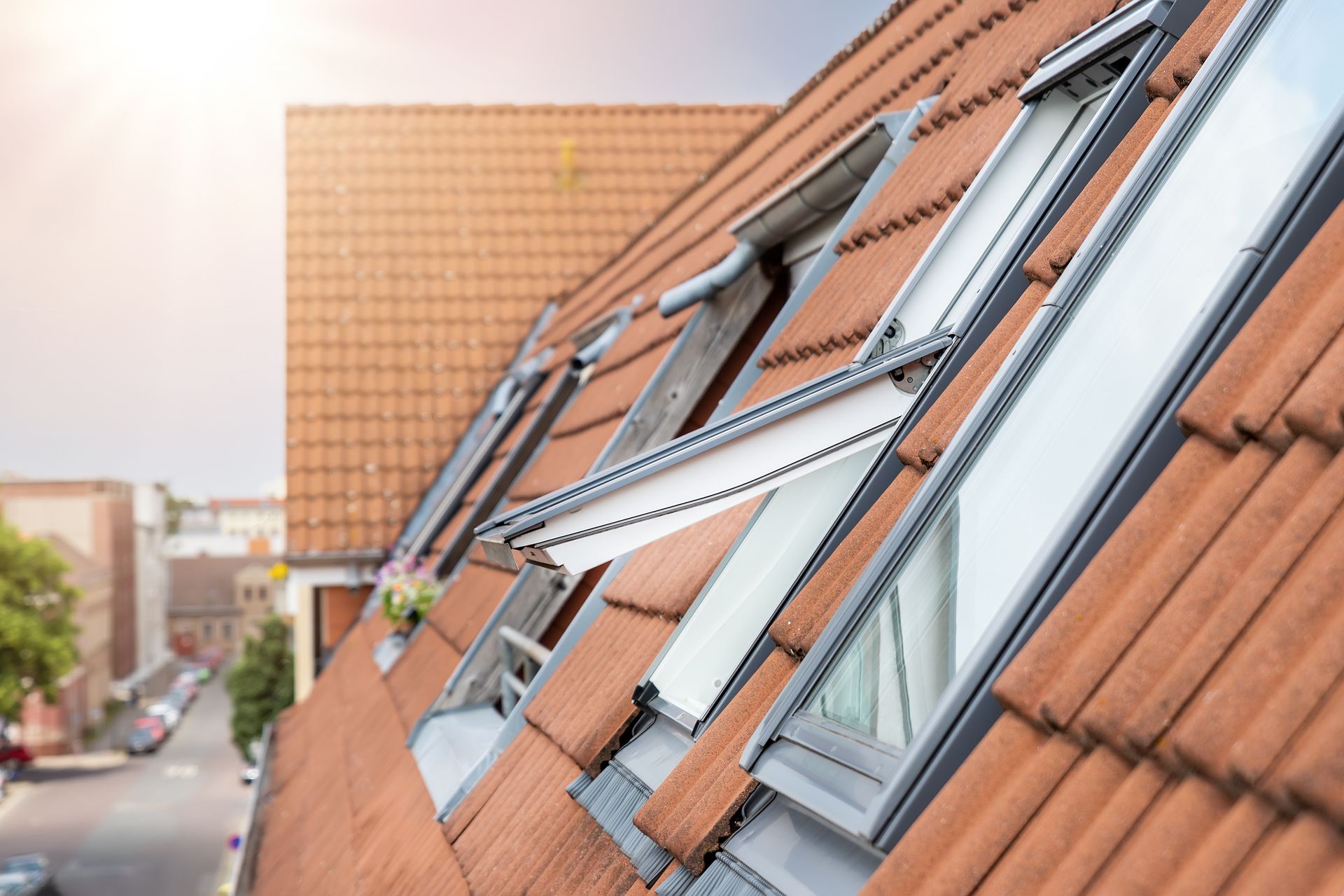 Open roof windows on a tiled roof, an example of window waterproofing