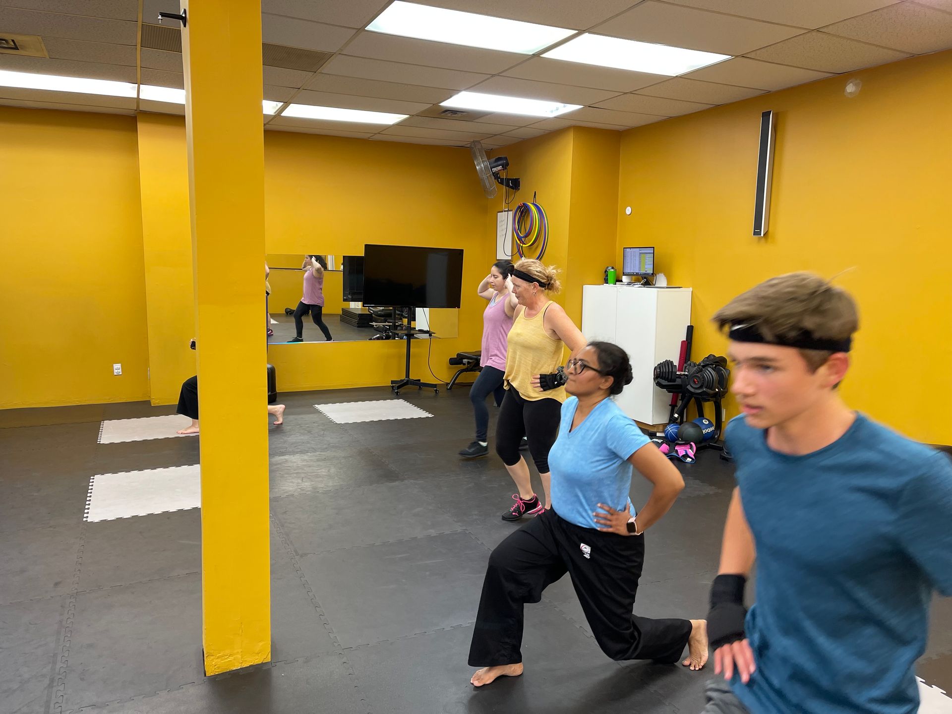 ELMA Fitness Kickboxing members smiling together after class