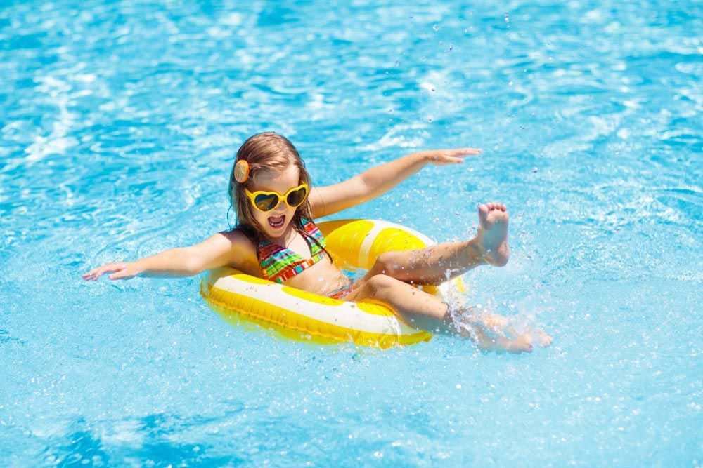 Girl Showing Things To Do In Forster Like Relaxing On Pool