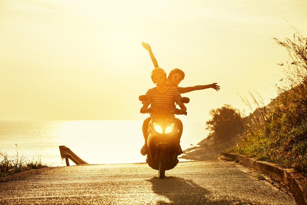 Couple On A Moped Travelling Through The Mid North Coast NSW