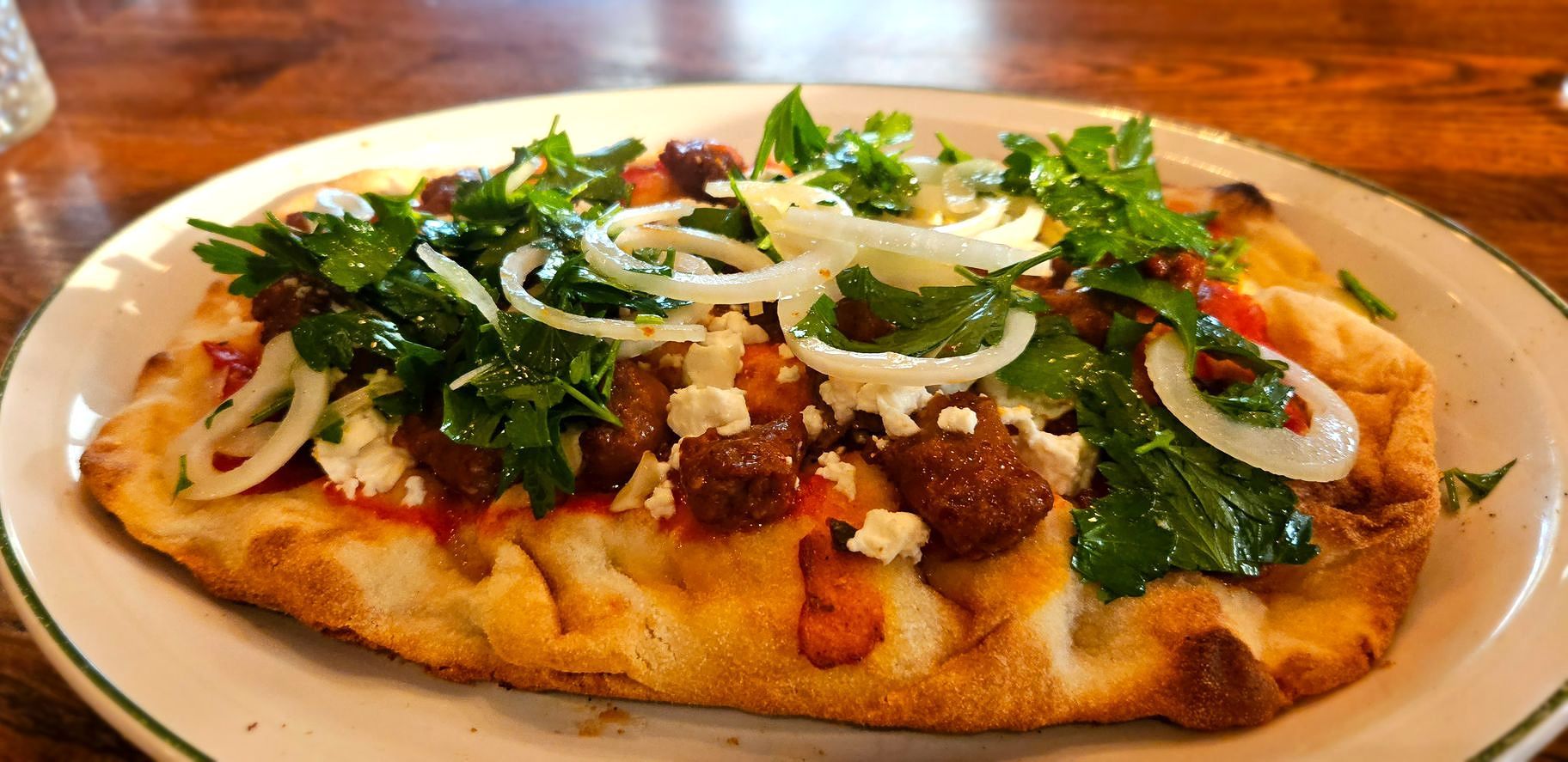 Pinsa met Merguez en Pittihe Harissa