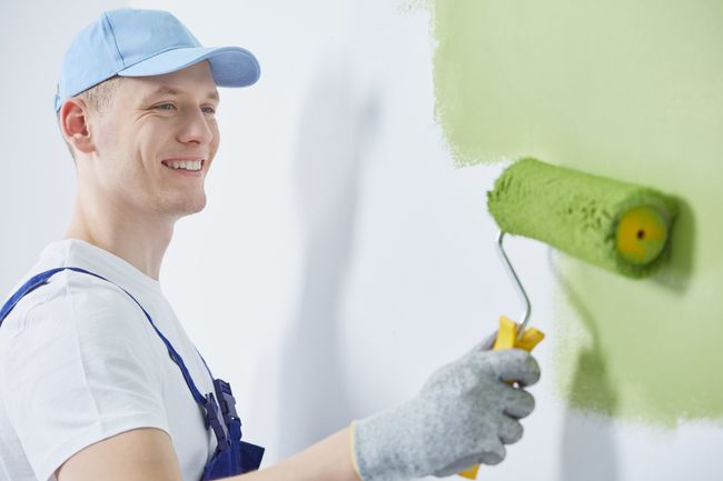 Peoria Painting Contractor applying green interior paint
