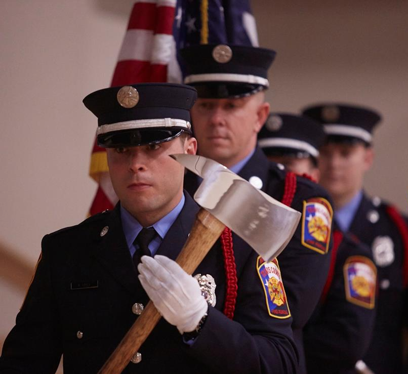 A picture of a fire fighter honor guard