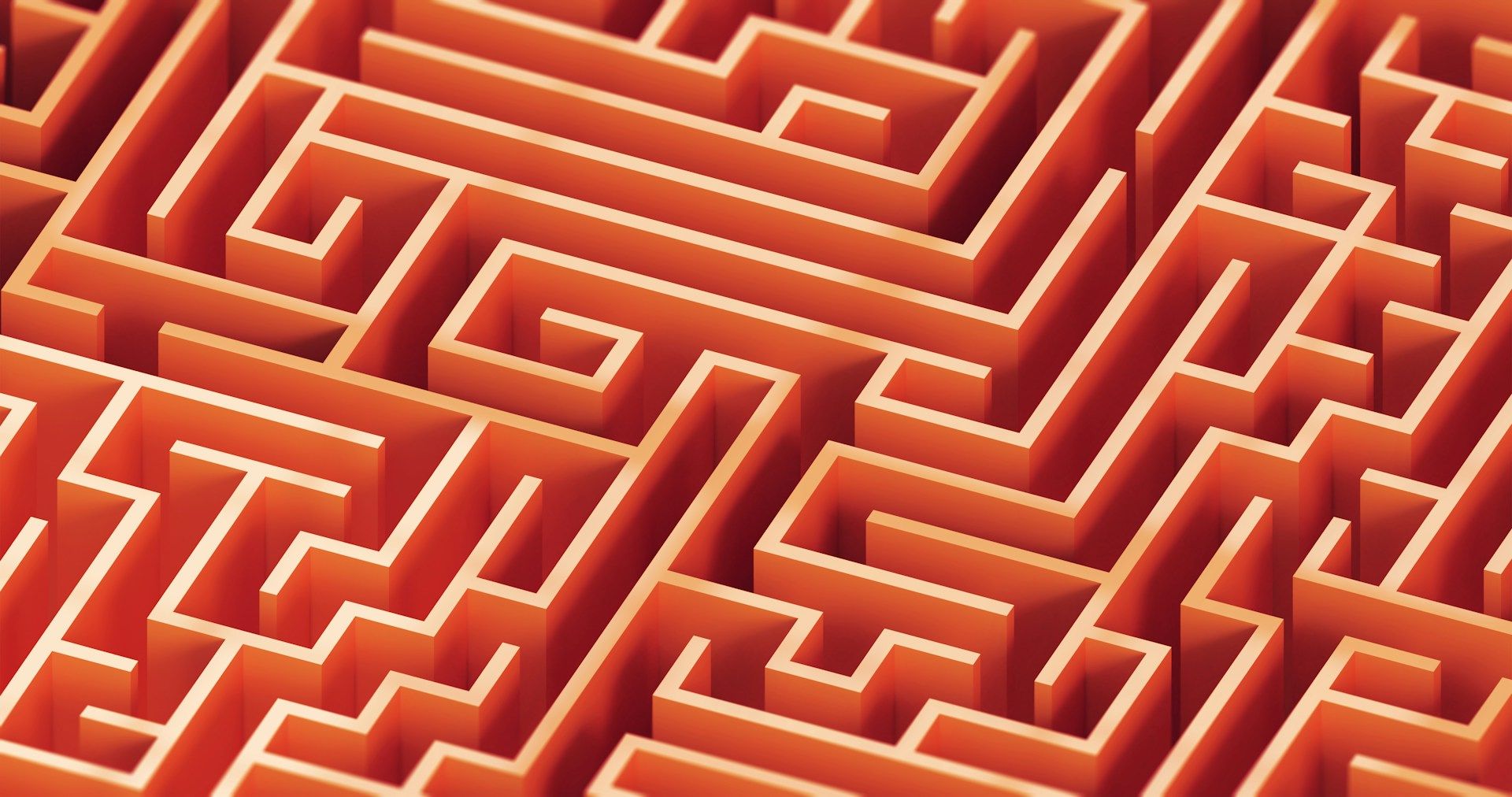 Abstract orange and red maze pattern with winding geometric corridors