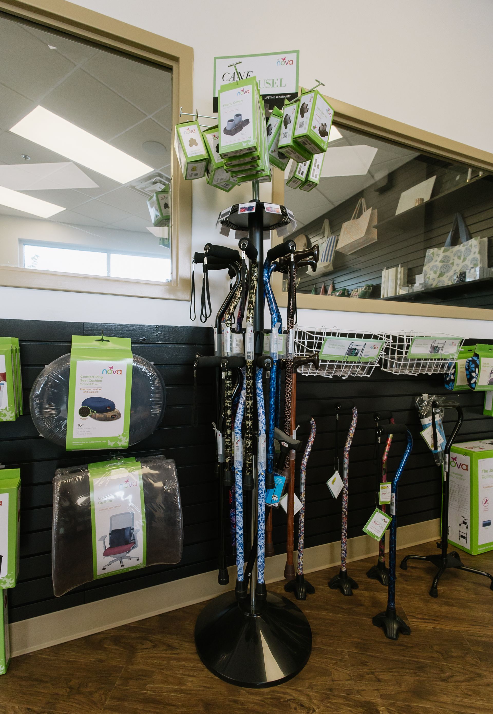 Display rack with green-and-white packaging in a store aisle