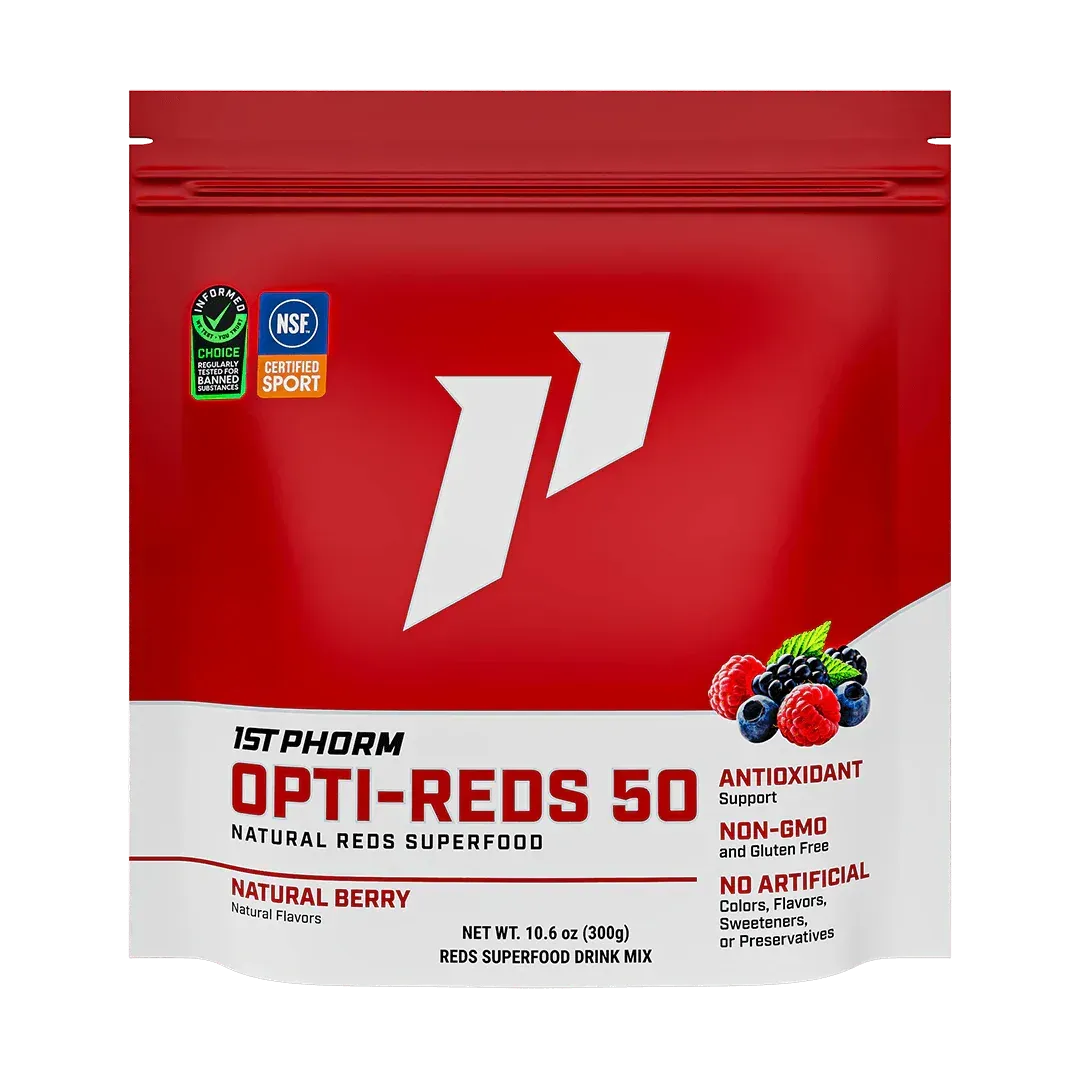Red and white protein powder bag labeled Opti-Reds 50 with berries and antioxidant claims