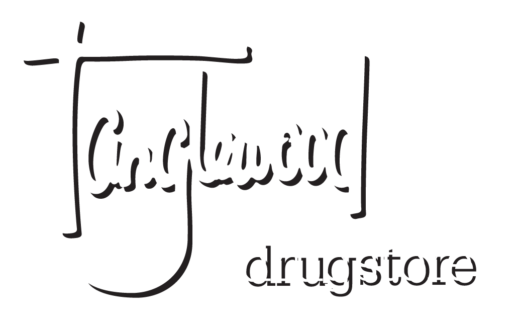 Stylized black-and-white logo reading “Tanglewood drugstore” with a handwritten wordmark inside a bracket-like frame