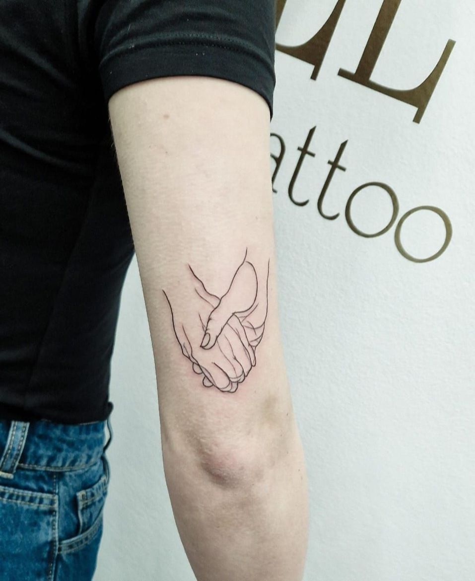 Tatuaggio sull'avambraccio con la scritta 
