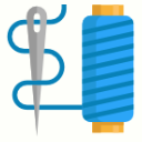 A silver sewing needle with a long blue thread snaking around it, positioned next to a spool of blue thread.
