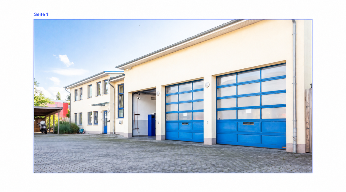 Außenansicht der Feuerwache mit blauen Garagentoren und einem Lebensstern-Symbol