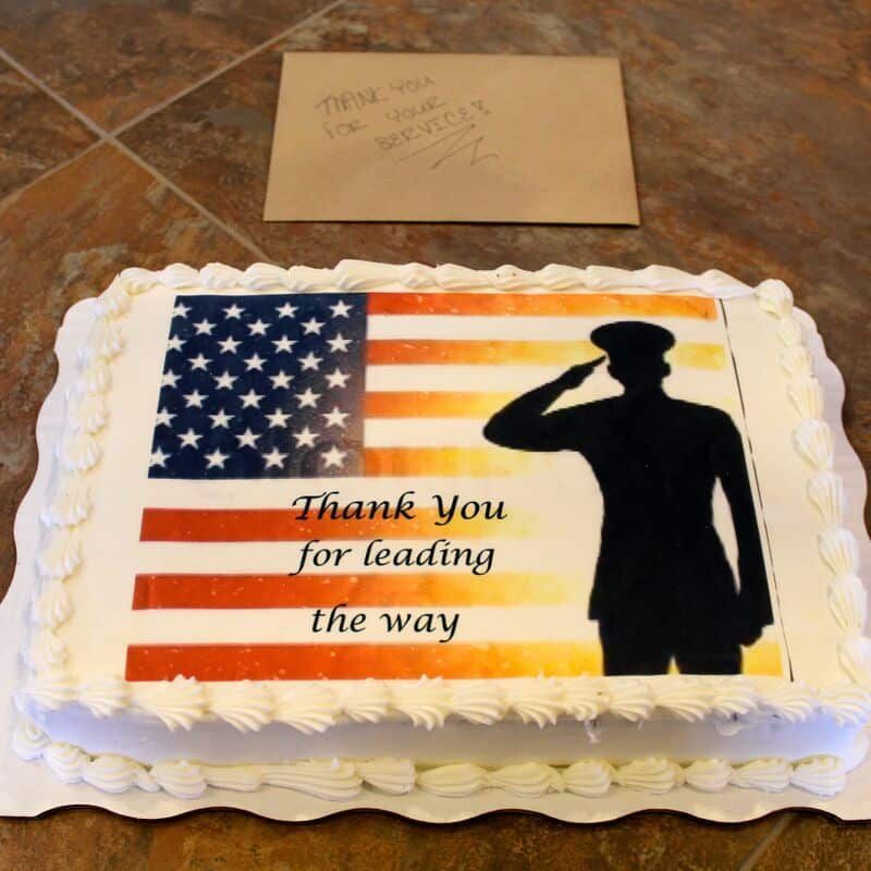 A cake that says thank you for leading the way