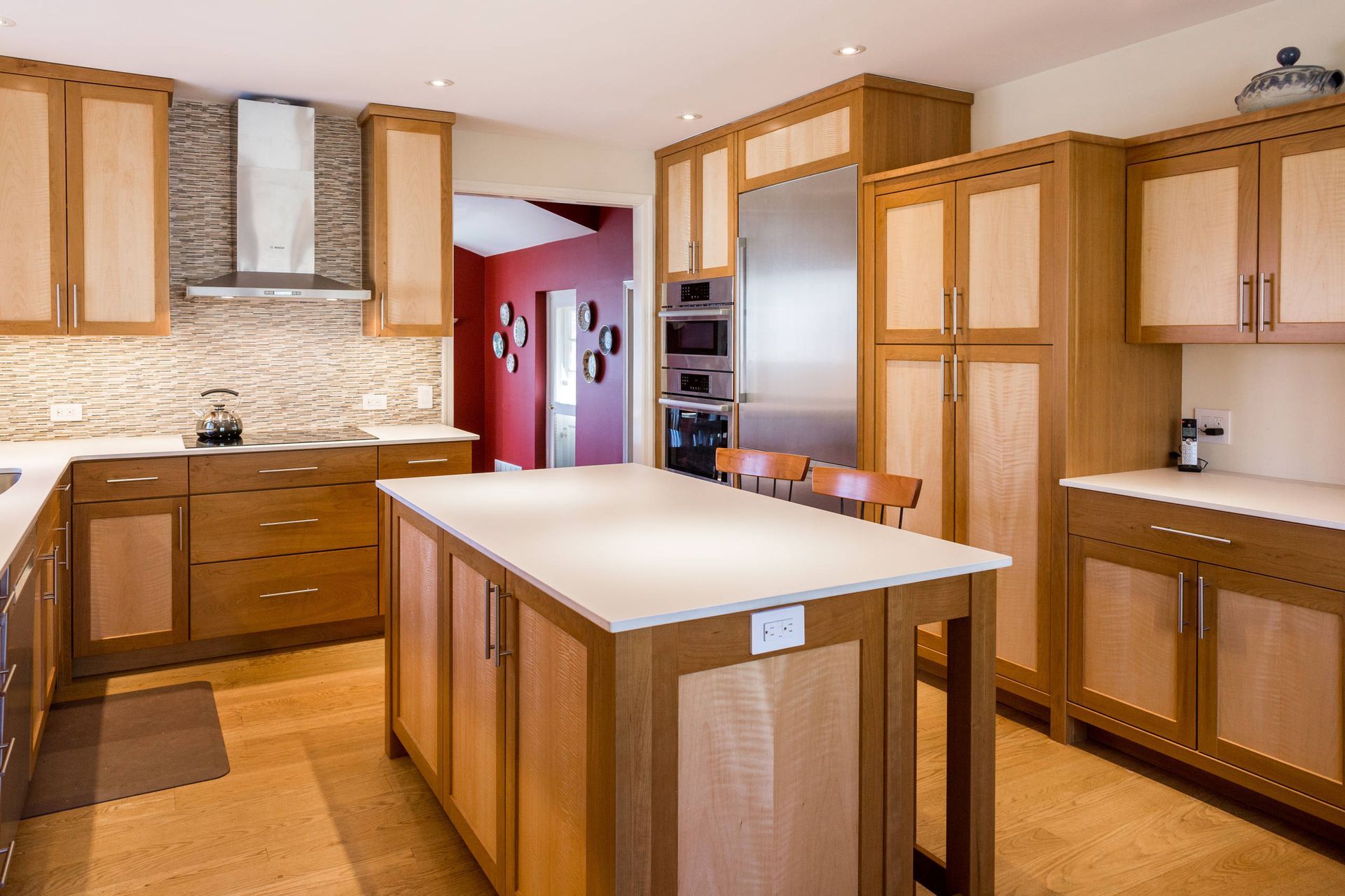 A kitchen with stainless steel appliances and wooden cabinets. James McCoy Remodeling Services Serving 19072,19003,19118,19444,19095 and surrounding areas