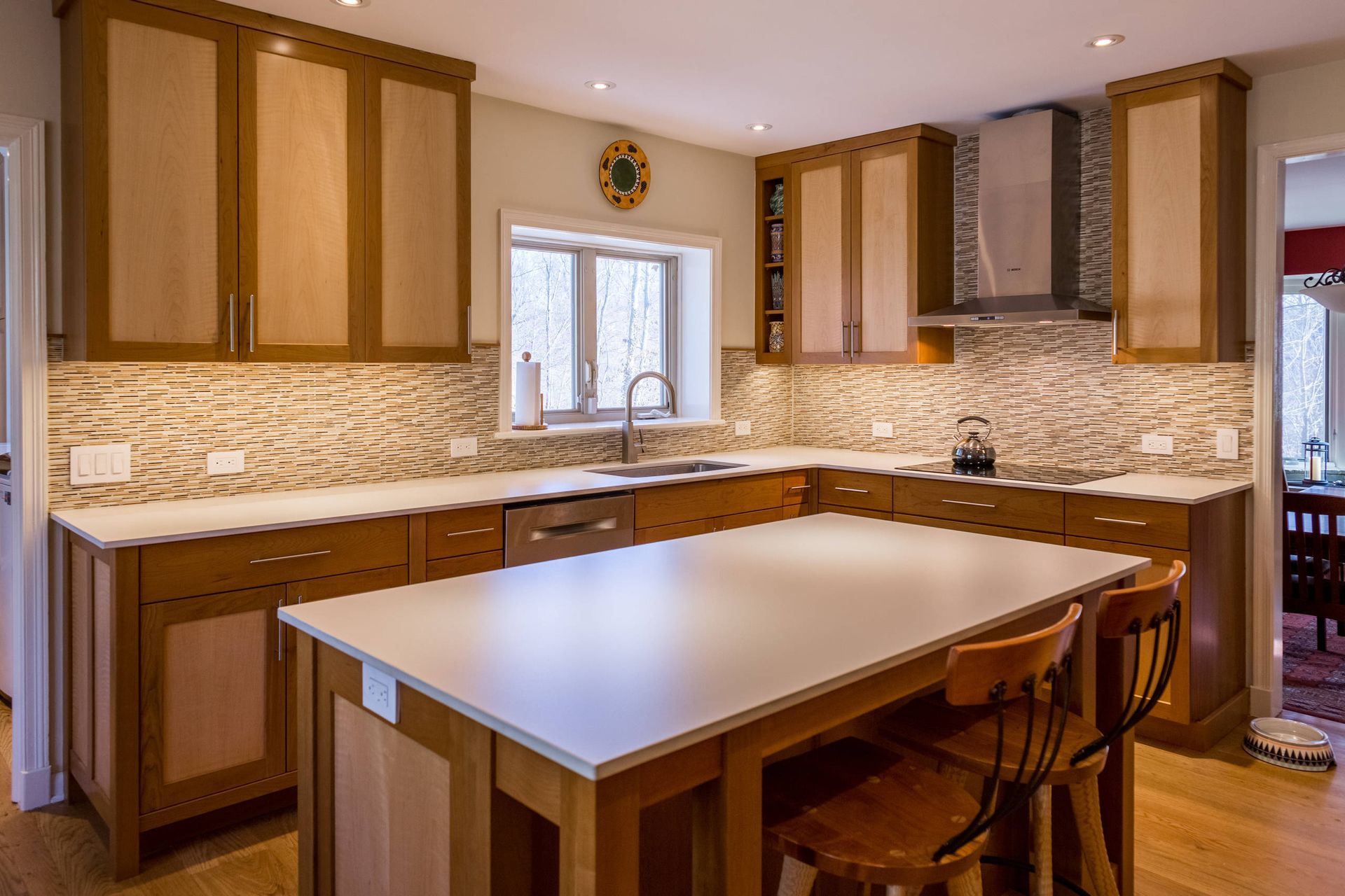 There is a large island in the middle of the kitchen. James McCoy Remodeling Services Serving 19072,19003,19118,19444,19095 and surrounding areas