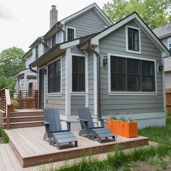A house with a deck and chairs in front of it. James McCoy Remodeling Services Serving 19072,19003,19118,19444,19095 and surrounding areas