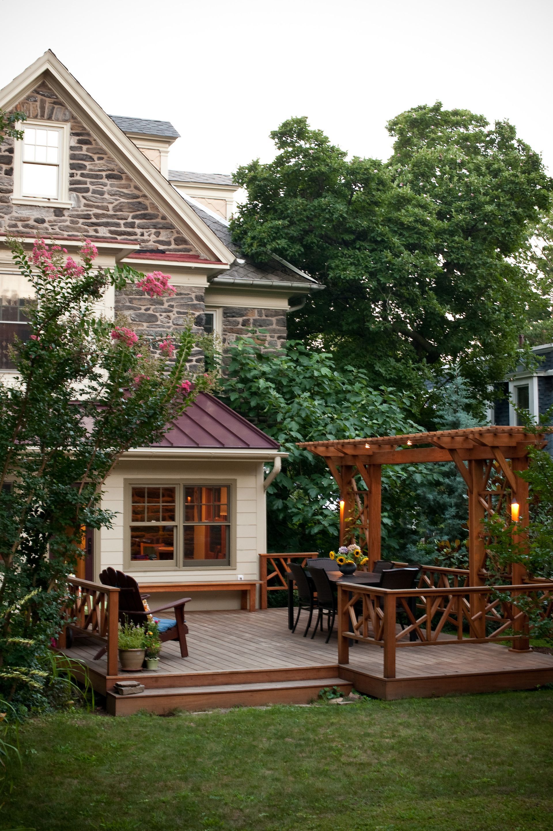 A house with a deck and a pergola in front of it. James McCoy Remodeling Services Serving 19072,19003,19118,19444,19095 and surrounding areas