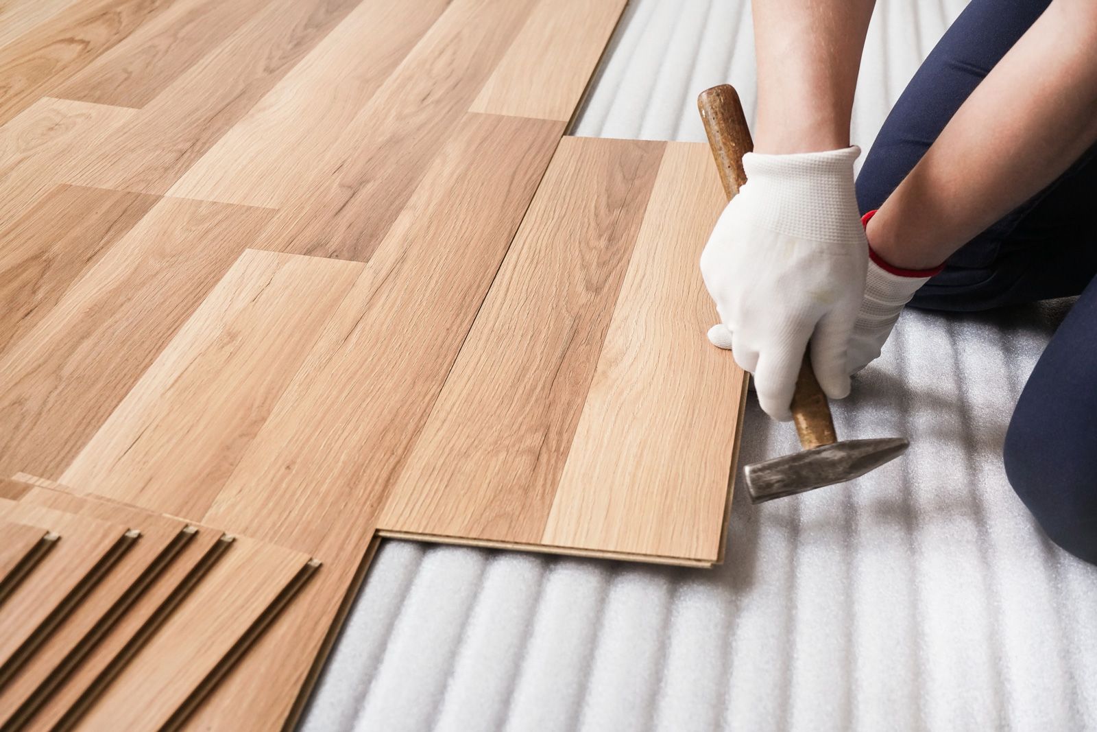 Installing Laminated Floor — Madison, WI — TOTL Construction, LLC
