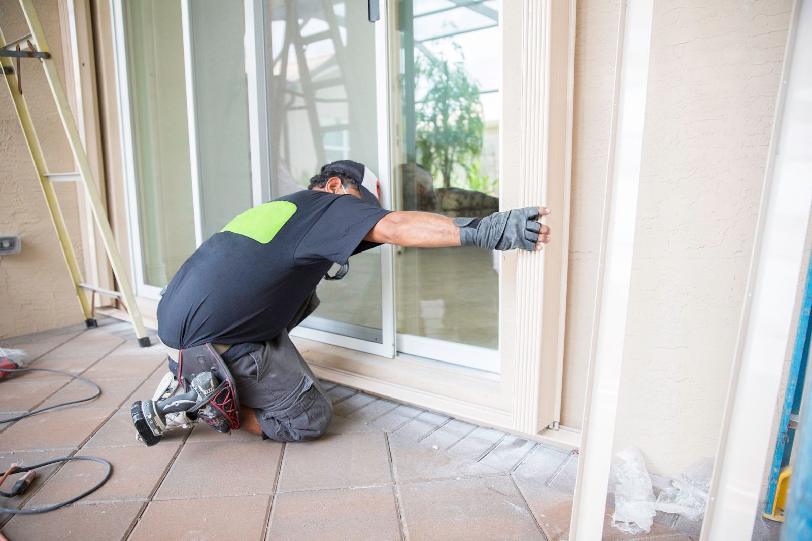 Installing Hurricane Shutters — Madison, WI — TOTL Construction, LLC