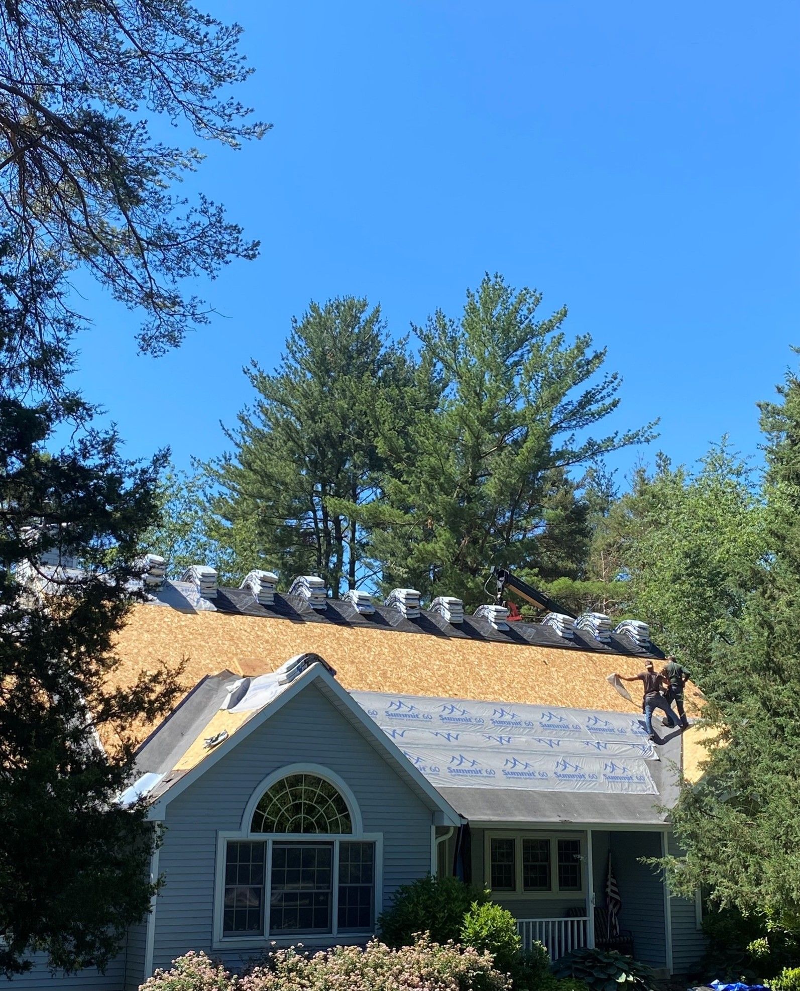 Man Working On The Roof — Madison, WI — TOTL Construction, LLC