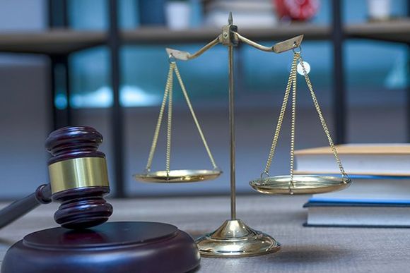 Law Books, Justice Scales, and Wooden Gavel — New London, CT — McGarry Prince McGarry Law Law Books, Justice Scales, and Wooden Gavel — New London, CT — McGarry Prince McGarry Law