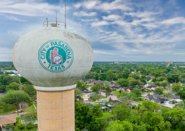 City of El Paso, Texas water tower above a leafy suburban neighborhood