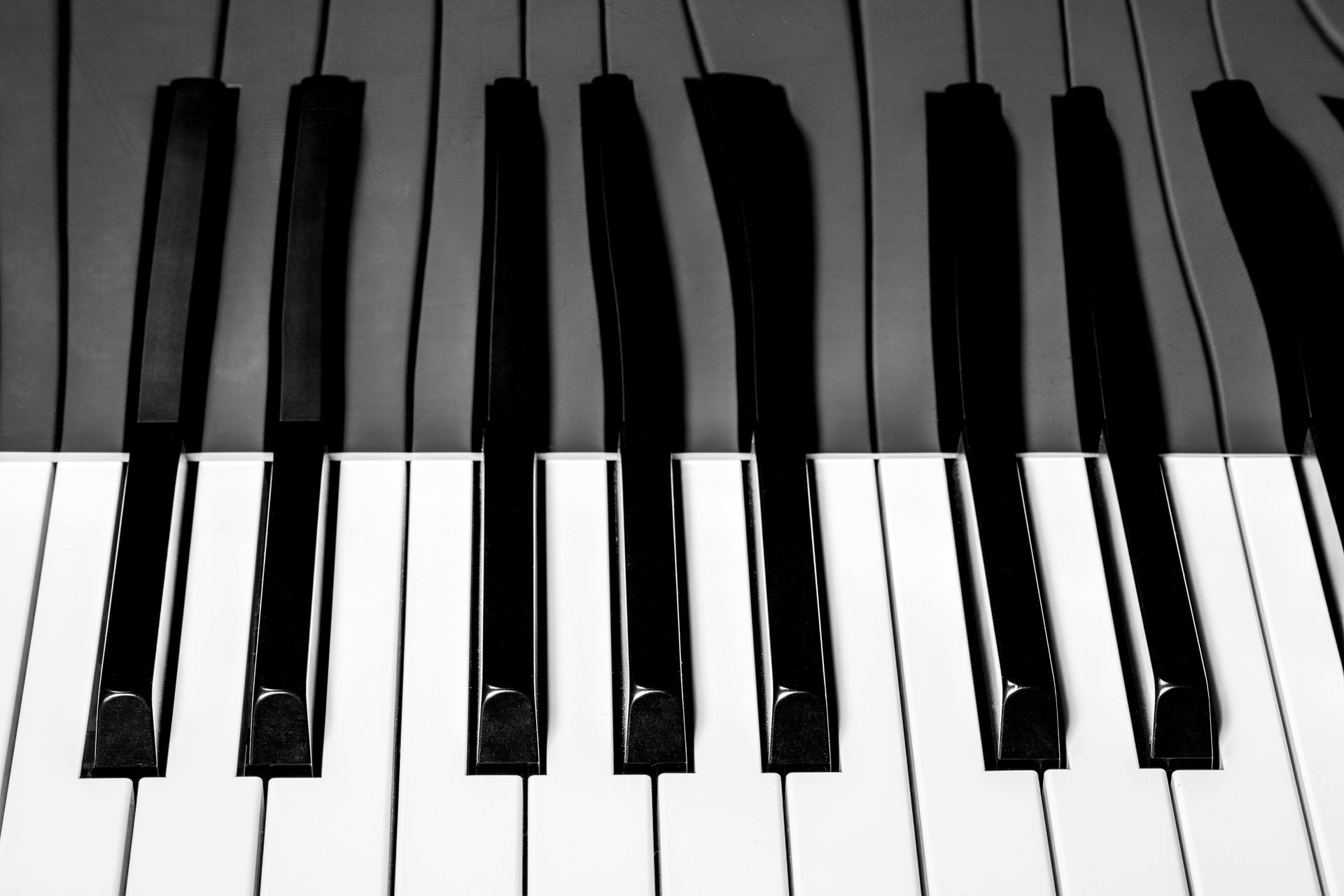 Black and white piano keys in close-up view