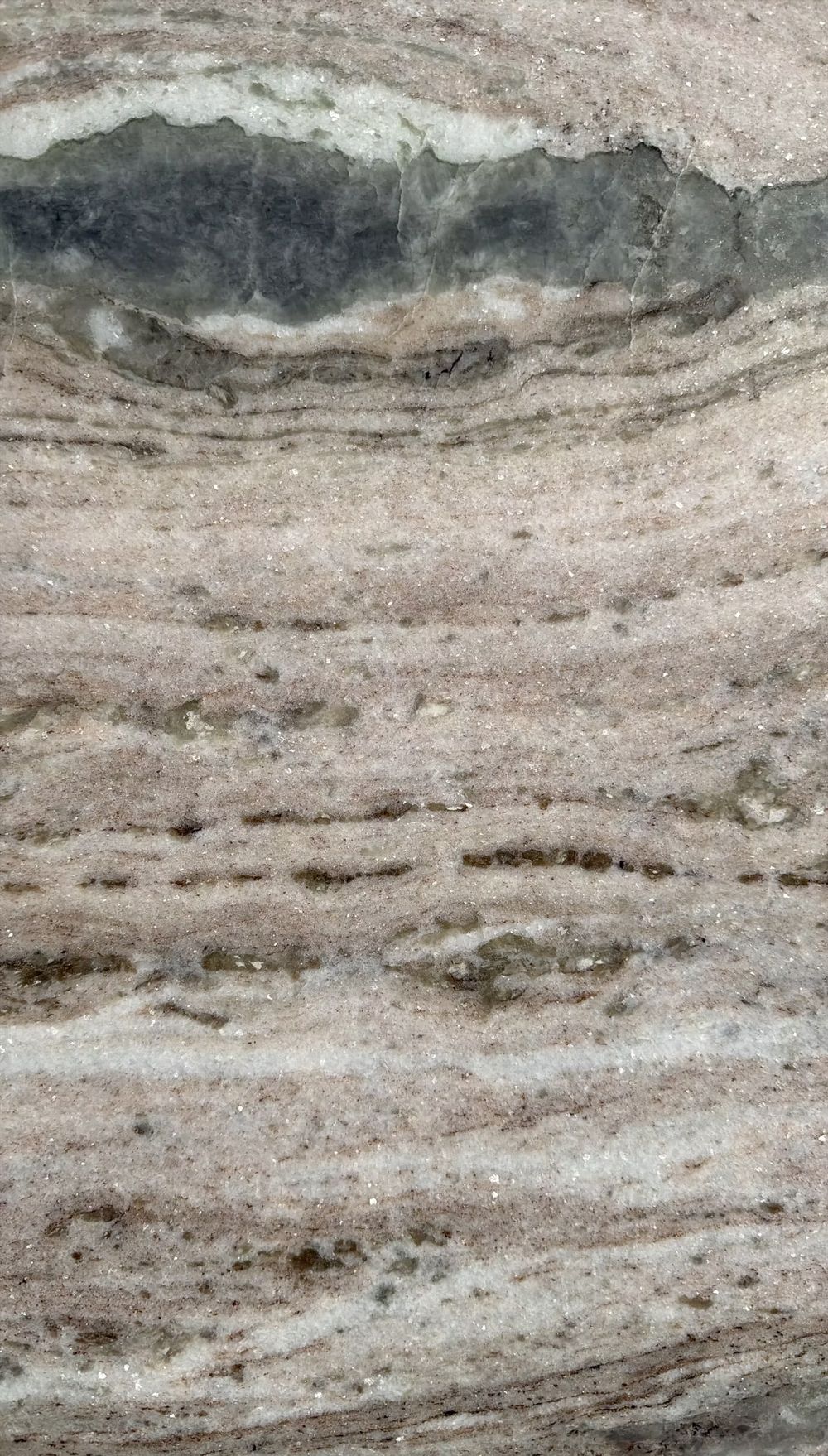 Blue-gray stone surface with veined, textured pattern