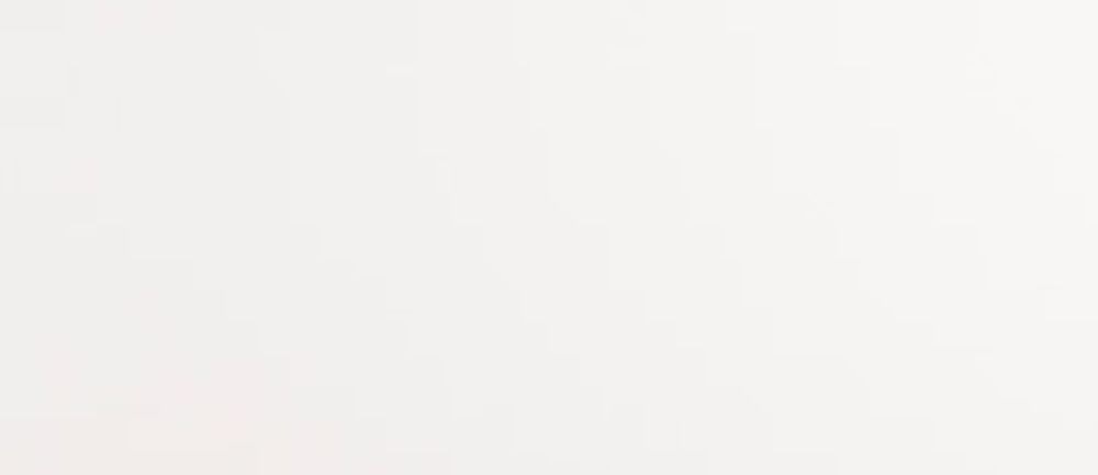 Blank off-white screen with a faint horizontal line near the lower third
