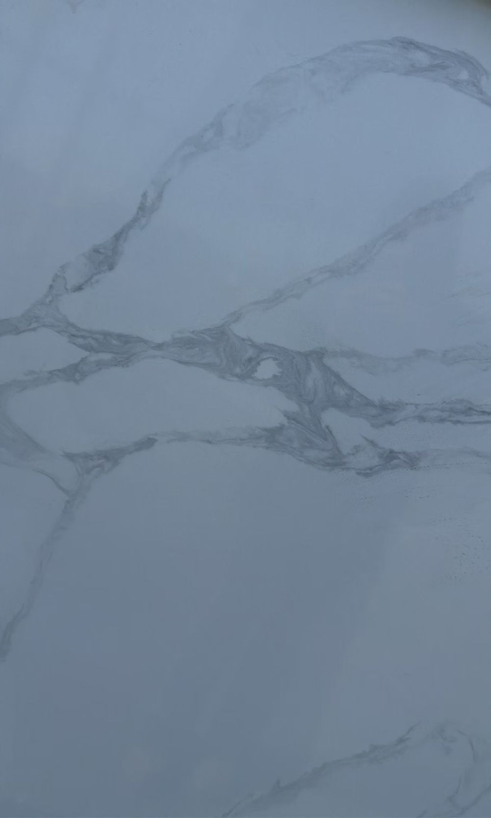 White marble surface with gray veining