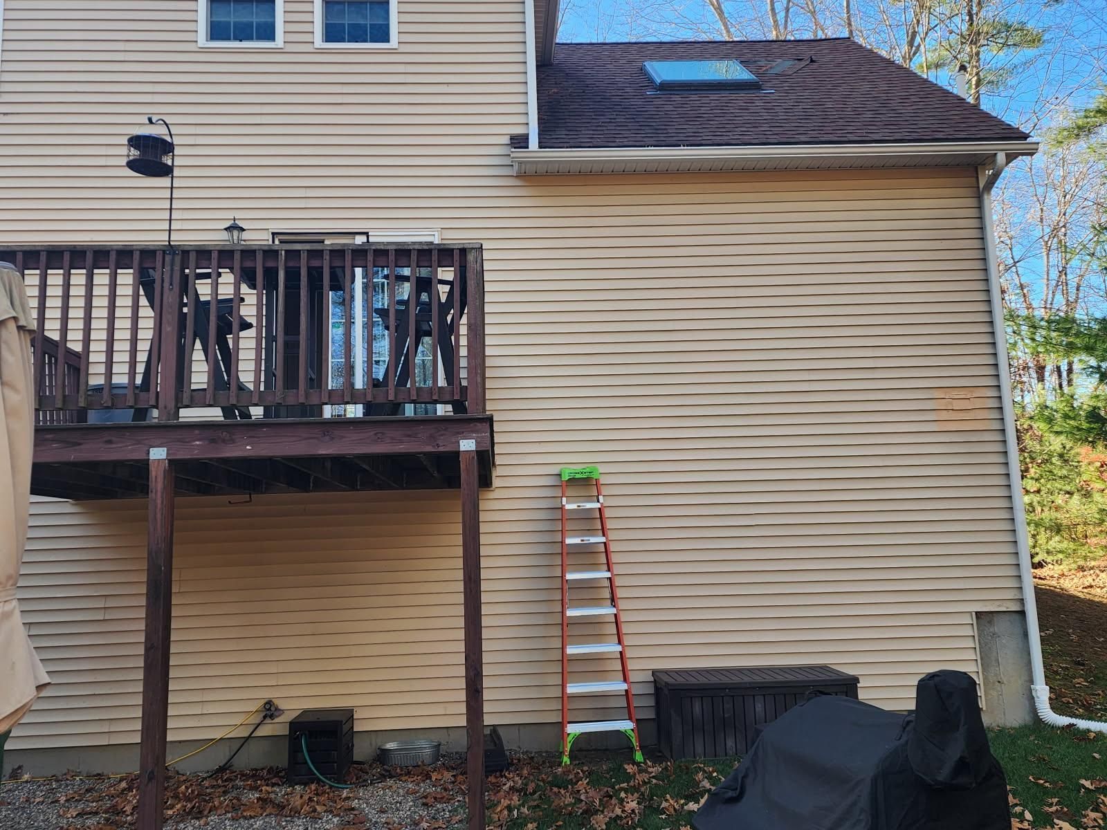 Back of house with deck.