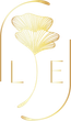 Gold stylized floral logo with thin line art and partial letters on a white background