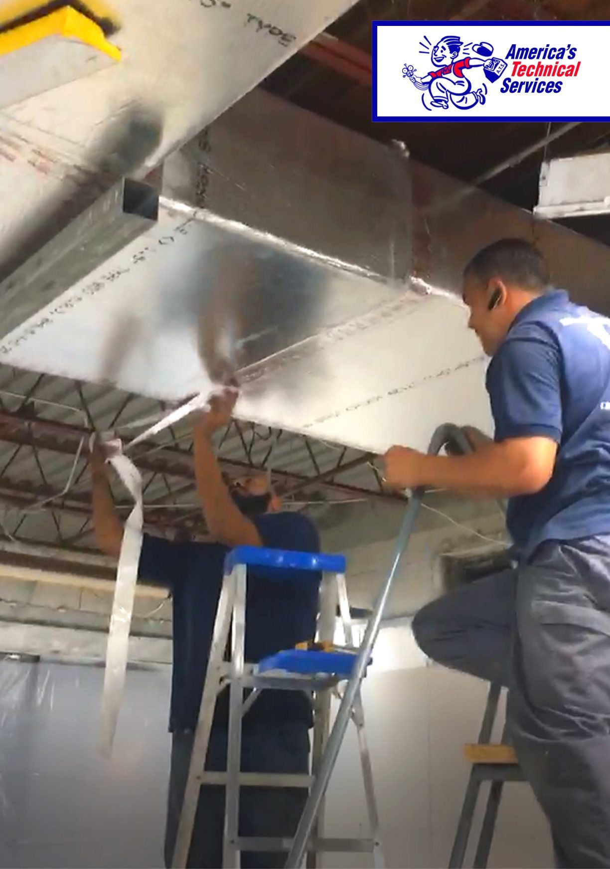Two technicians sealing HVAC ductwork with tape; indoors.