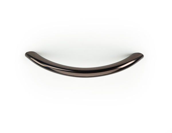 A close up of a curved metal handle on a white background.